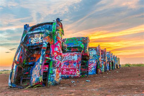 Cadillac ranch texas - I n 1997, urban sprawl forced an exhumation of Cadillac Ranch and a replanting two miles away in its’ current location of I-40 just west of Amarillo. Not only were the cars moved and replaced in exactly the same situations, but the trash and surrounding debris was also moved and scattered about the new location. Earl Schieb's Nightmare.